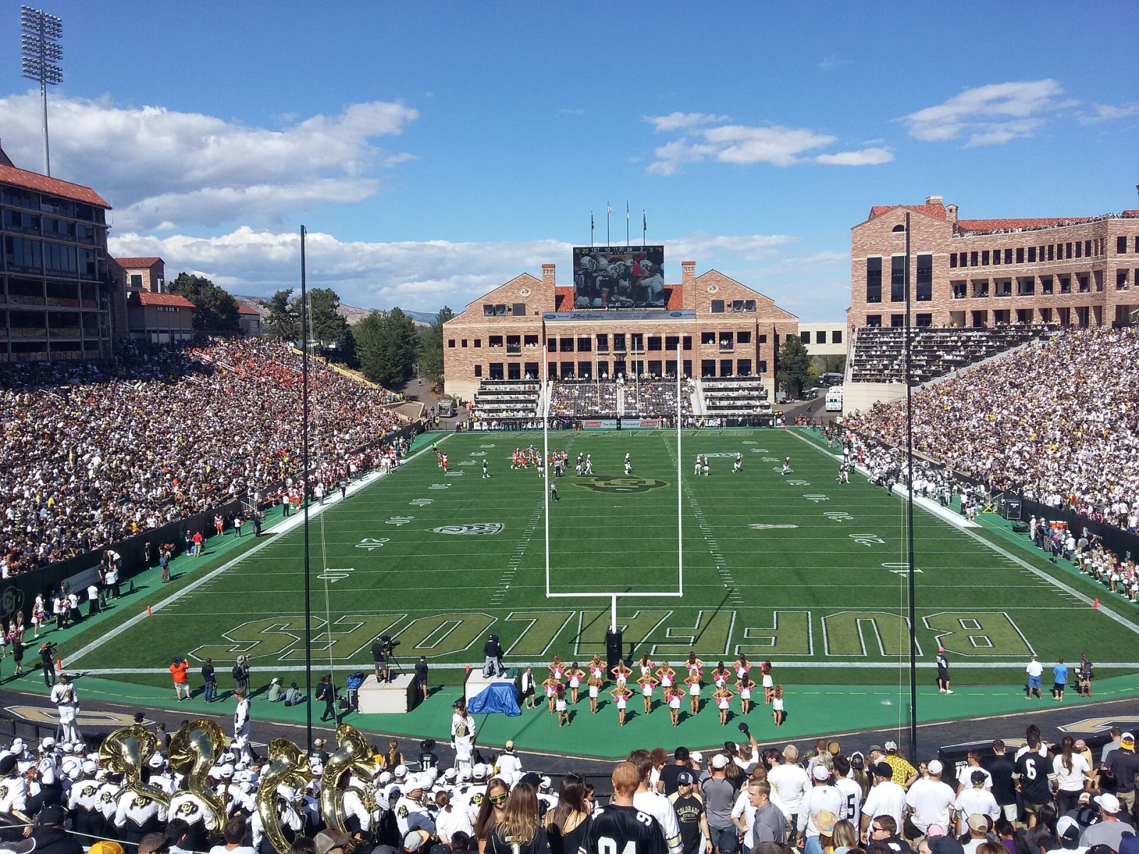 Football field and crowded stands at Folsom Field in Boulder, Colorado